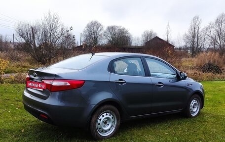 KIA Rio III рестайлинг, 2014 год, 700 000 рублей, 31 фотография