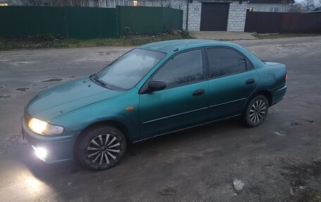 Mazda 323, 1997 год, 110 000 рублей, 5 фотография