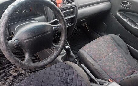 Mazda 323, 1997 год, 110 000 рублей, 8 фотография