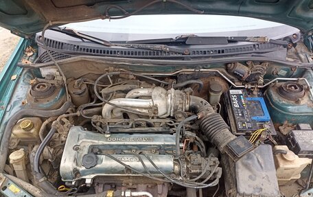 Mazda 323, 1997 год, 110 000 рублей, 11 фотография