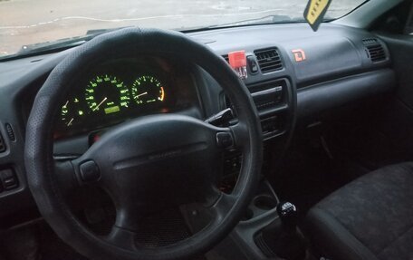 Mazda 323, 1997 год, 110 000 рублей, 12 фотография