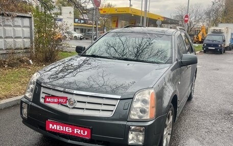 Cadillac SRX II рестайлинг, 2007 год, 600 000 рублей, 1 фотография