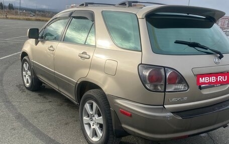 Lexus RX IV рестайлинг, 2000 год, 730 000 рублей, 4 фотография