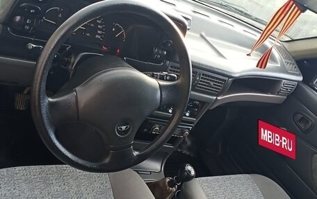 Daewoo Nexia I рестайлинг, 2004 год, 100 000 рублей, 11 фотография