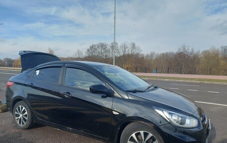Hyundai Solaris II рестайлинг, 2011 год, 680 000 рублей, 14 фотография