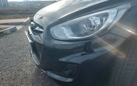 Hyundai Solaris II рестайлинг, 2011 год, 680 000 рублей, 24 фотография