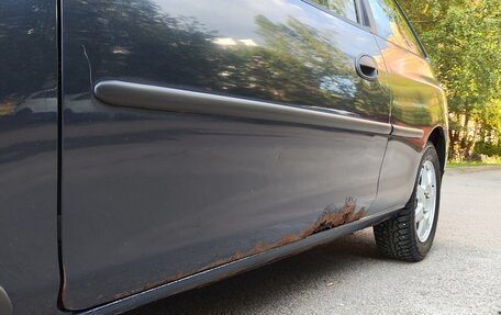 Mazda 323, 1999 год, 180 000 рублей, 12 фотография