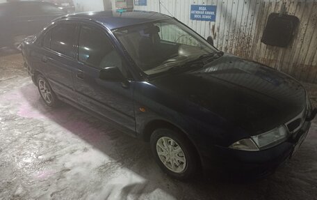 Mitsubishi Carisma I, 1997 год, 155 000 рублей, 1 фотография