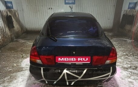 Mitsubishi Carisma I, 1997 год, 155 000 рублей, 4 фотография
