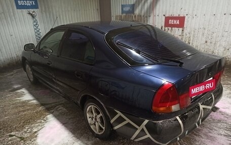 Mitsubishi Carisma I, 1997 год, 155 000 рублей, 3 фотография