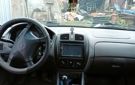 Mazda 323, 1999 год, 200 000 рублей, 9 фотография