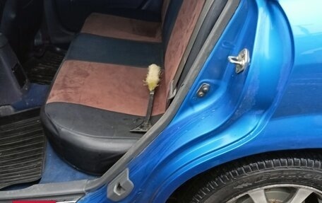 Mazda 323, 1999 год, 200 000 рублей, 10 фотография