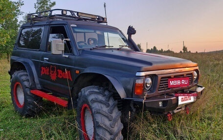 Nissan Safari IV, 1994 год, 1 700 000 рублей, 12 фотография