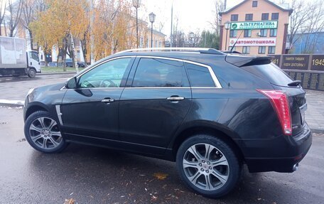 Cadillac SRX II рестайлинг, 2012 год, 1 350 000 рублей, 3 фотография