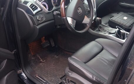 Cadillac SRX II рестайлинг, 2012 год, 1 350 000 рублей, 22 фотография