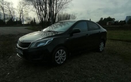 KIA Rio III рестайлинг, 2012 год, 750 000 рублей, 2 фотография