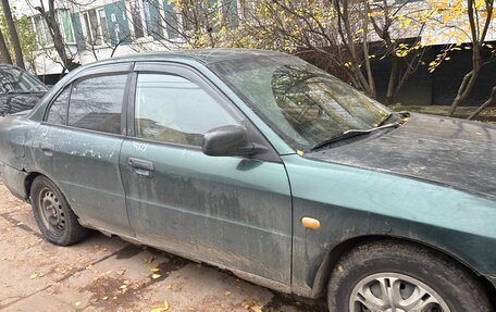Mitsubishi Mirage VI рестайлинг, 2000 год, 200 000 рублей, 2 фотография