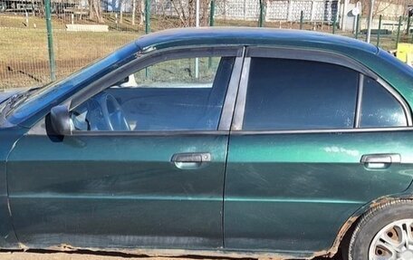 Mitsubishi Mirage VI рестайлинг, 2000 год, 200 000 рублей, 6 фотография