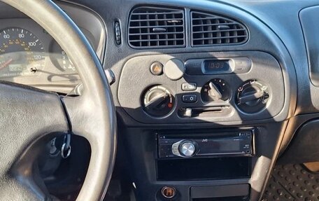 Mitsubishi Mirage VI рестайлинг, 2000 год, 200 000 рублей, 5 фотография