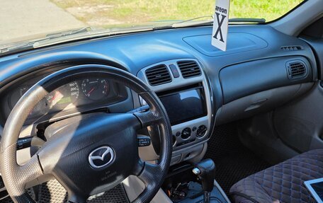 Mazda 323, 2000 год, 300 000 рублей, 7 фотография