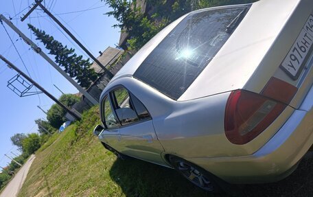 Mitsubishi Lancer VII, 1997 год, 235 000 рублей, 5 фотография