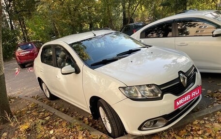 Renault Logan II, 2014 год, 650 000 рублей, 4 фотография