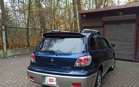 Mitsubishi Outlander III рестайлинг 3, 2003 год, 750 000 рублей, 8 фотография