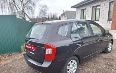 KIA Carens III (RP), 2010 год, 850 000 рублей, 4 фотография