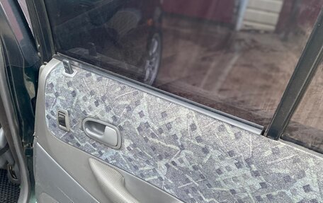 Mazda 323, 1999 год, 235 000 рублей, 8 фотография