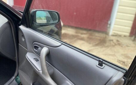 Mazda 323, 1999 год, 235 000 рублей, 10 фотография