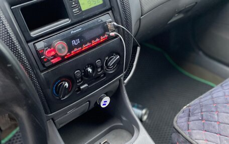 Mazda 323, 1999 год, 235 000 рублей, 6 фотография