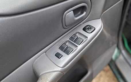 Mazda 323, 1999 год, 235 000 рублей, 7 фотография