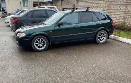 Mazda 323, 1999 год, 235 000 рублей, 3 фотография