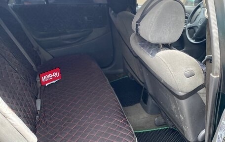 Mazda 323, 1999 год, 235 000 рублей, 9 фотография