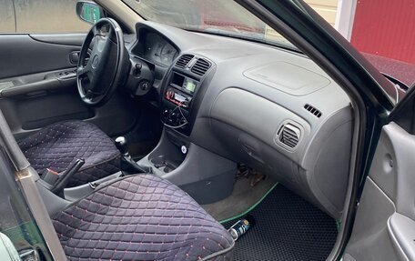 Mazda 323, 1999 год, 235 000 рублей, 11 фотография