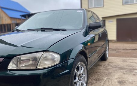 Mazda 323, 1999 год, 235 000 рублей, 15 фотография