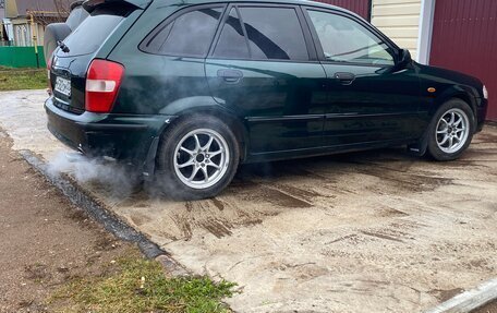 Mazda 323, 1999 год, 235 000 рублей, 12 фотография