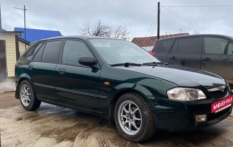 Mazda 323, 1999 год, 235 000 рублей, 16 фотография