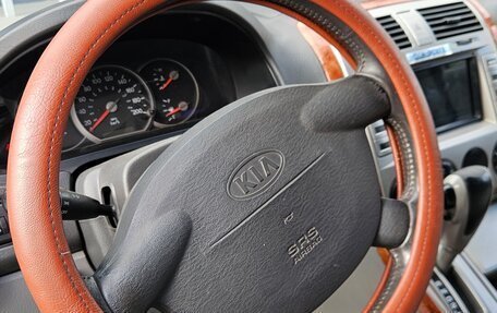 KIA Carnival III, 2005 год, 595 000 рублей, 10 фотография