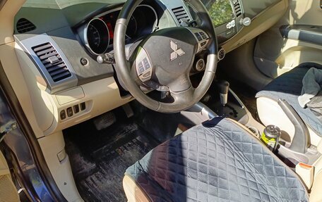 Mitsubishi Outlander III рестайлинг 3, 2008 год, 1 100 000 рублей, 14 фотография