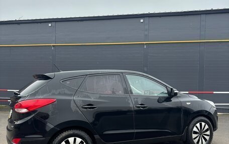 Hyundai Tucson III, 2011 год, 1 050 000 рублей, 4 фотография