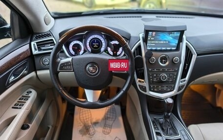 Cadillac SRX II рестайлинг, 2010 год, 1 450 000 рублей, 17 фотография