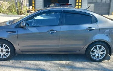 KIA Rio III рестайлинг, 2012 год, 650 000 рублей, 2 фотография