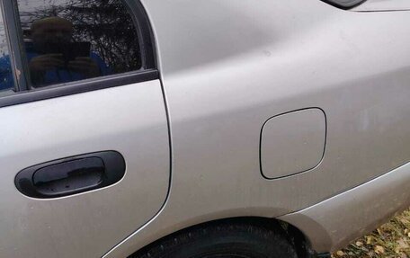 Mitsubishi Carisma I, 2002 год, 300 000 рублей, 1 фотография