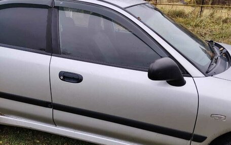 Mitsubishi Carisma I, 2002 год, 300 000 рублей, 11 фотография