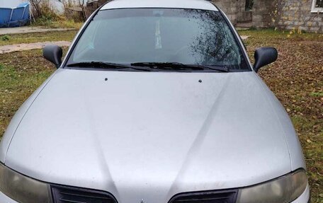 Mitsubishi Carisma I, 2002 год, 300 000 рублей, 10 фотография