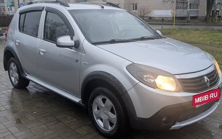 Renault Sandero I, 2013 год, 750 000 рублей, 2 фотография