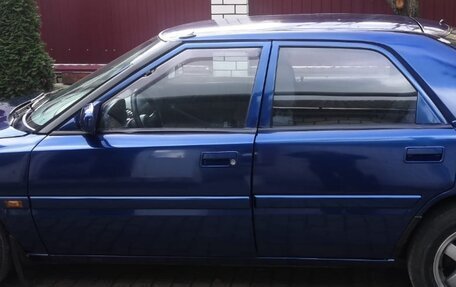 Mazda 323, 1989 год, 280 000 рублей, 3 фотография