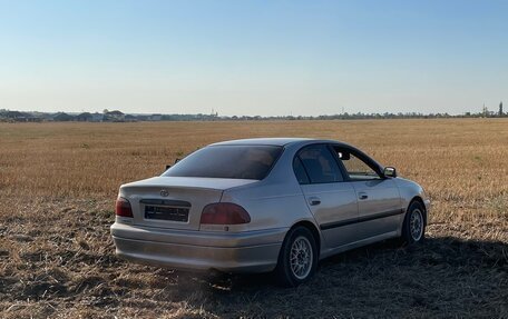 Toyota Avensis III рестайлинг, 1998 год, 350 000 рублей, 24 фотография