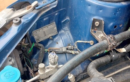 Toyota Yaris I рестайлинг, 2001 год, 300 000 рублей, 14 фотография